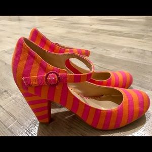 Orange and pink woman’s size 9 heels.